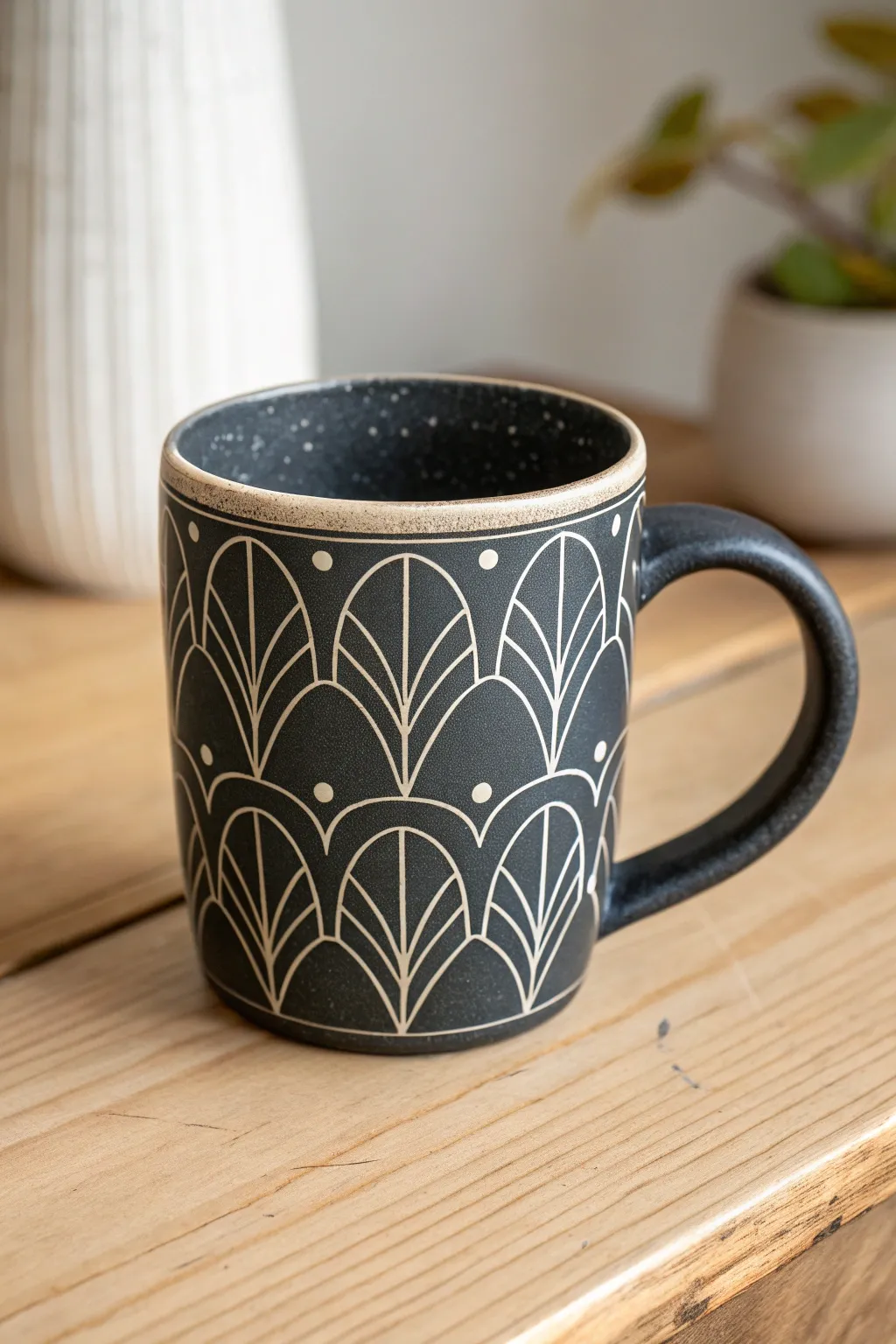 Bold black slip mug with clean sgraffito lines for an easy, high-contrast handmade look