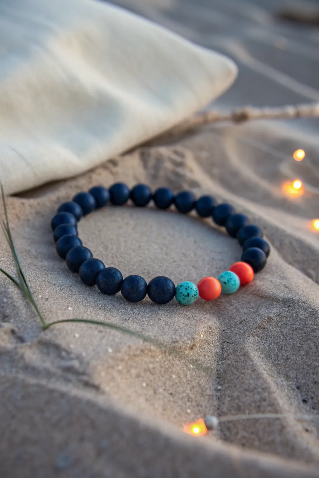 Navy clay bracelet with glowing beads and bright accents, perfect for warm summer nights