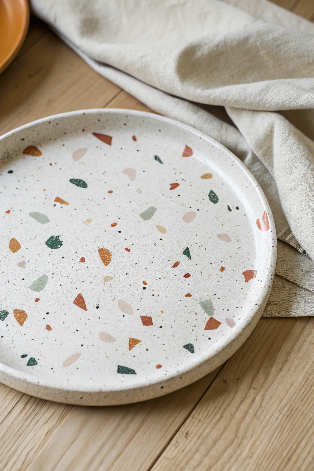 Terrazzo speckle sprinkle plate: minimal, modern, and easy to recreate with simple underglaze dabs.