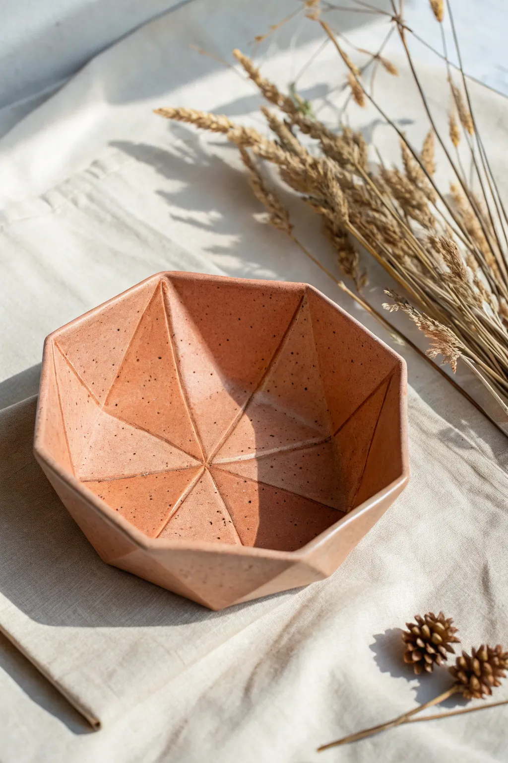 Minimal origami-style slab bowl with crisp folds and matte clay finish for serene handmade decor.