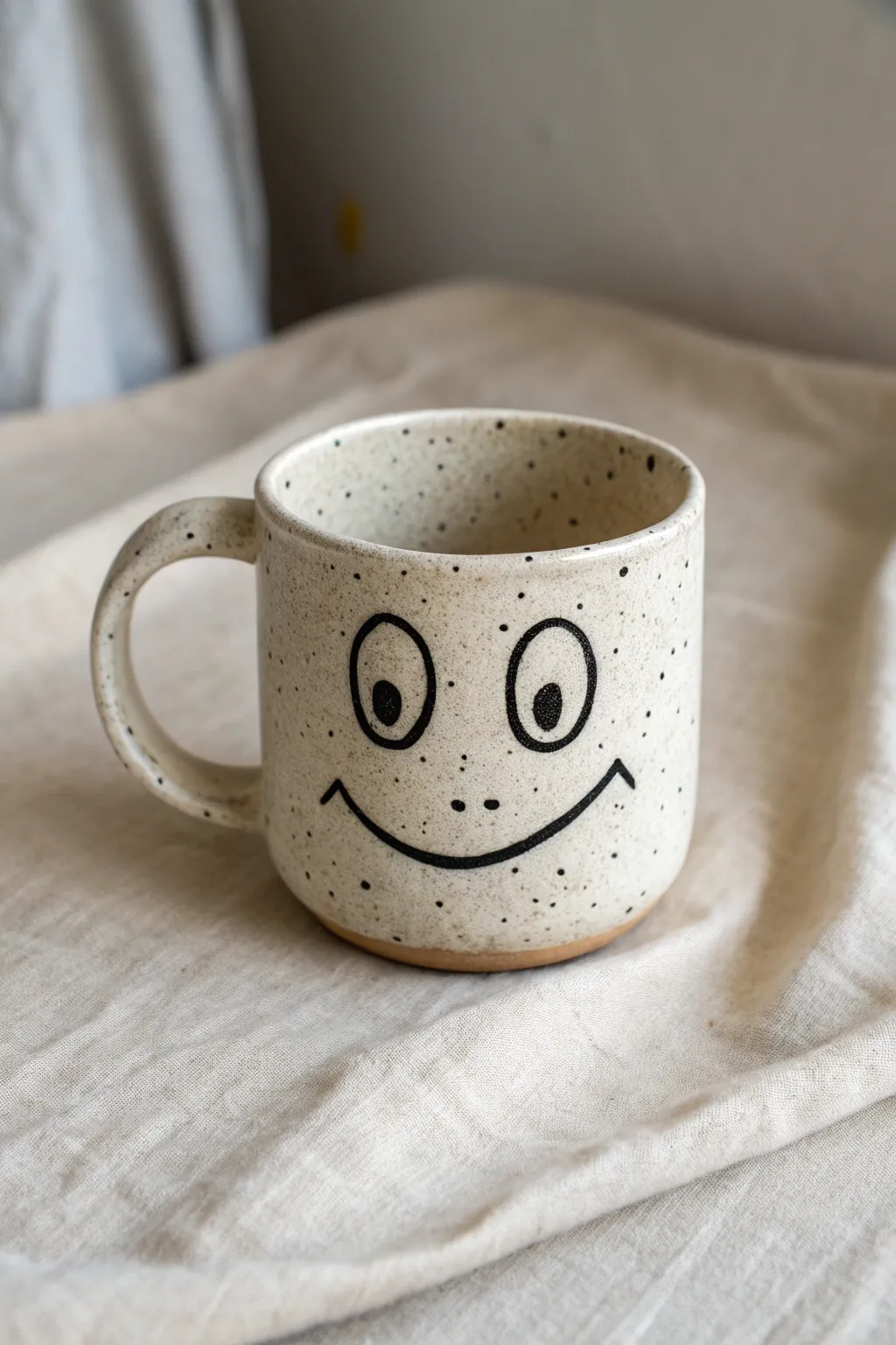 A two-faced mood mug: sweet smile on one side, hilariously grumpy on the other