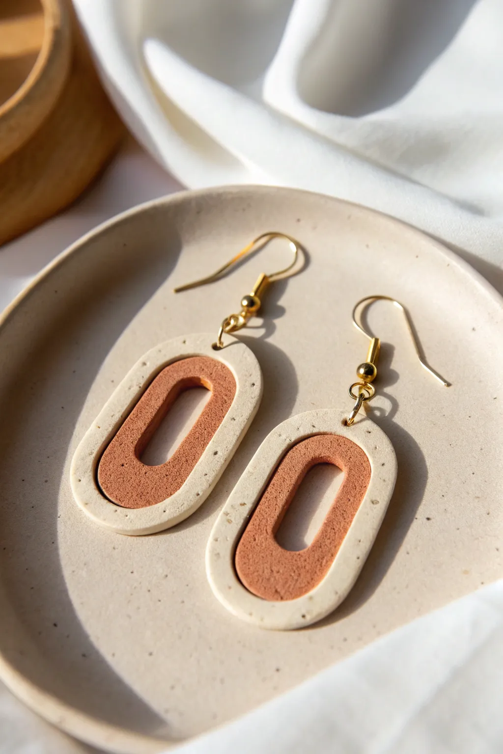 Layered cutout polymer clay shadowbox earrings with a crisp window reveal and minimalist boho vibe