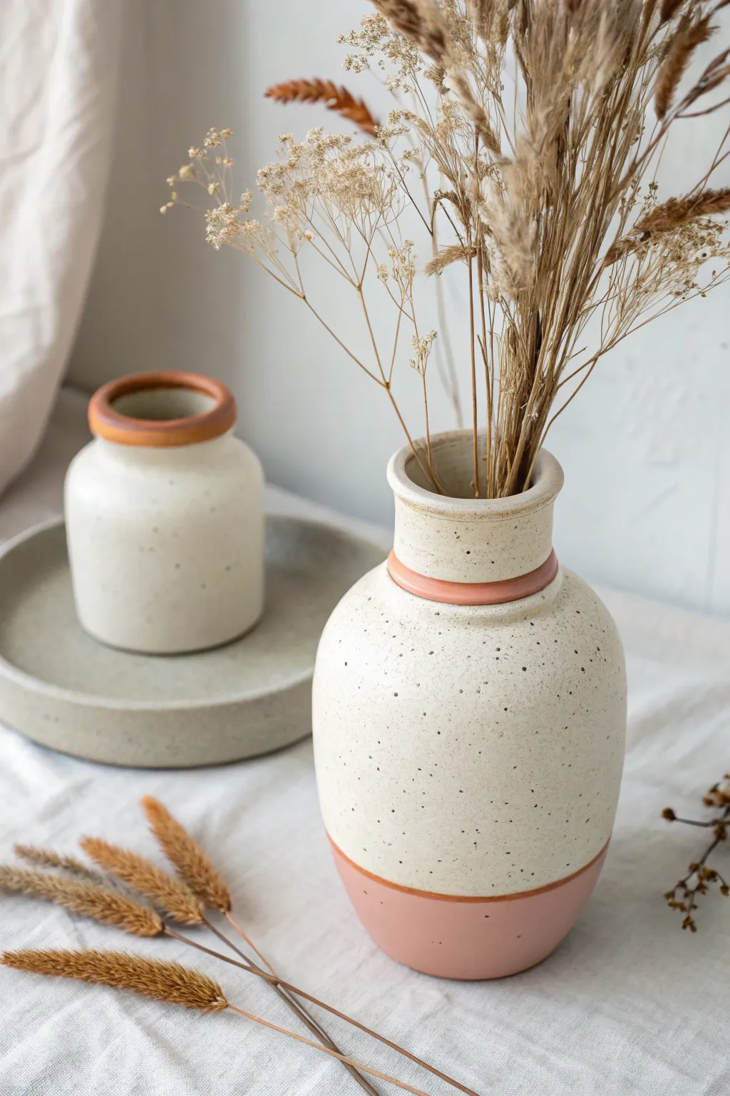 Swap-able polymer clay vase collars: one textured, one color-blocked for an easy refresh.
