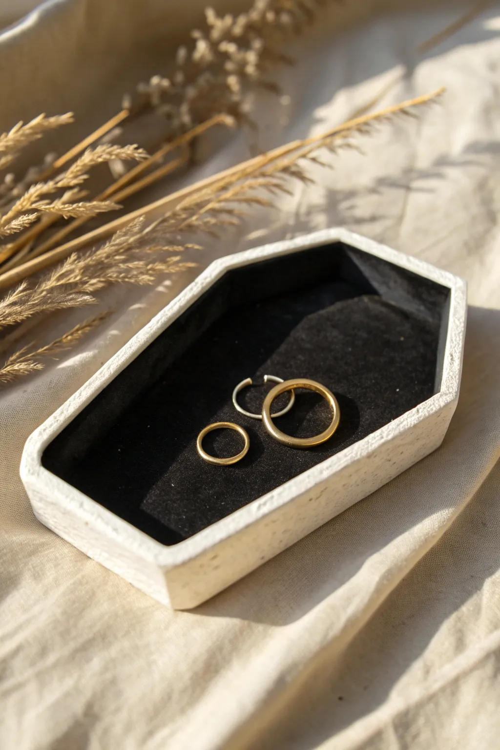 Matte black coffin tray with a crisp border, perfect for rings and tiny earrings this Halloween.