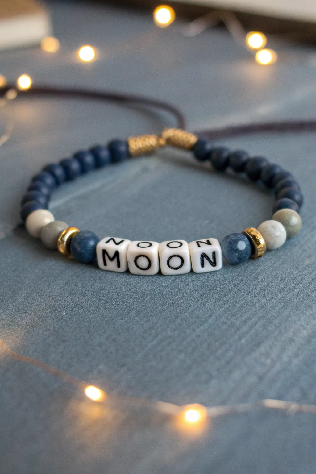 Night sky clay bead bracelet with MOON word and glow beads for a soft, dreamy look.
