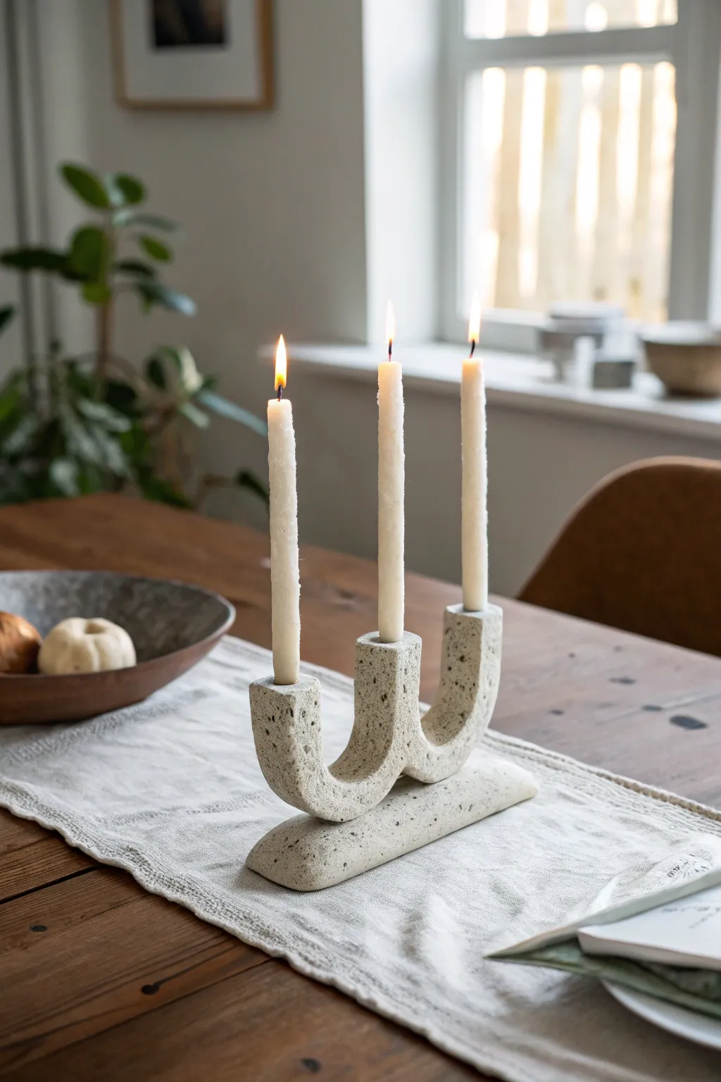 Handmade wavy clay mini candelabra for three tapers, minimalist boho table styling.