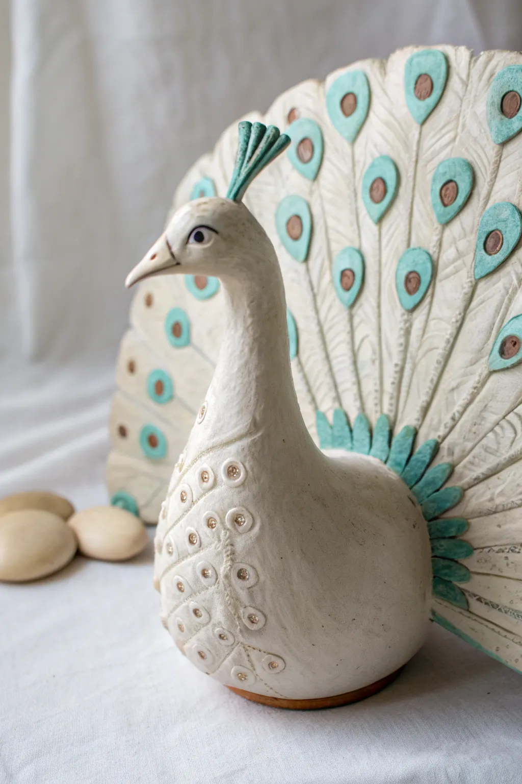 Beginner clay peacock with an easy textured fan tail and simple painted dot details