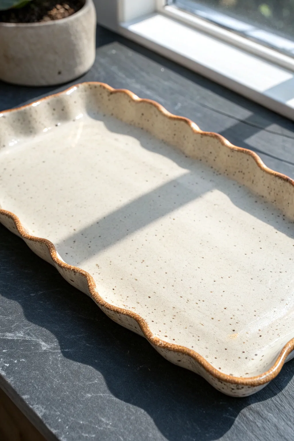 Wavy rim slab tray with an organic edge, perfect for serving with minimalist boho style.