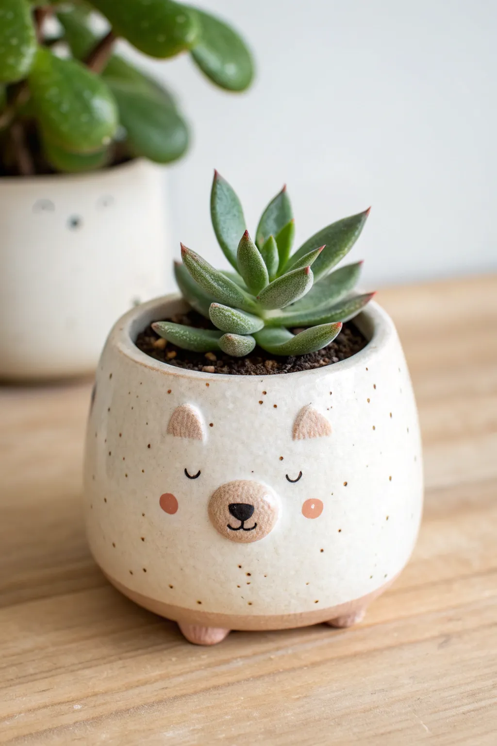 Beginner pinch pot animal planter: a minimalist sweet critter with a succulent crown.
