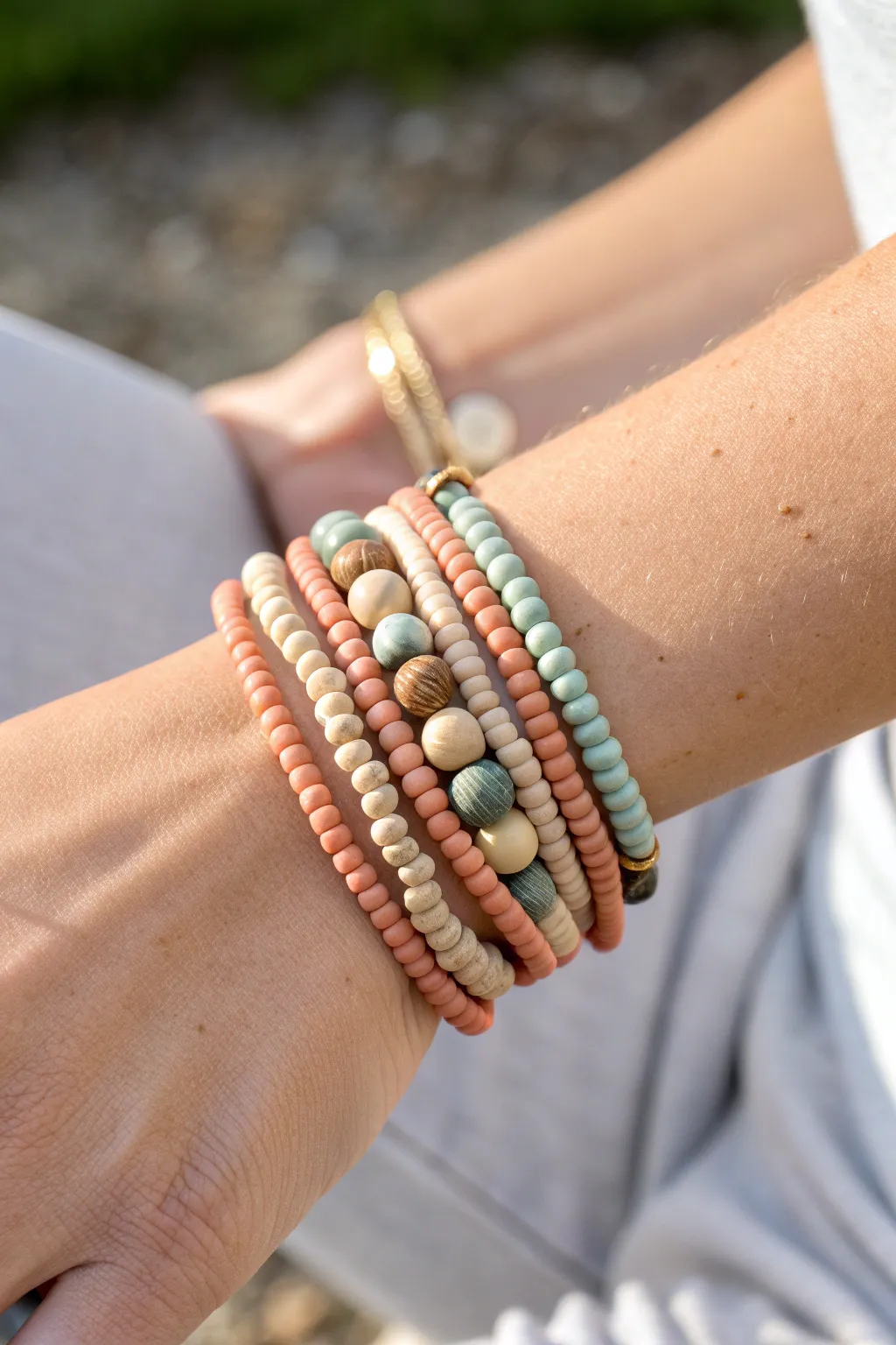 Minimalist mixed-thickness heishi clay bead stack in soft neutrals for effortless boho layering