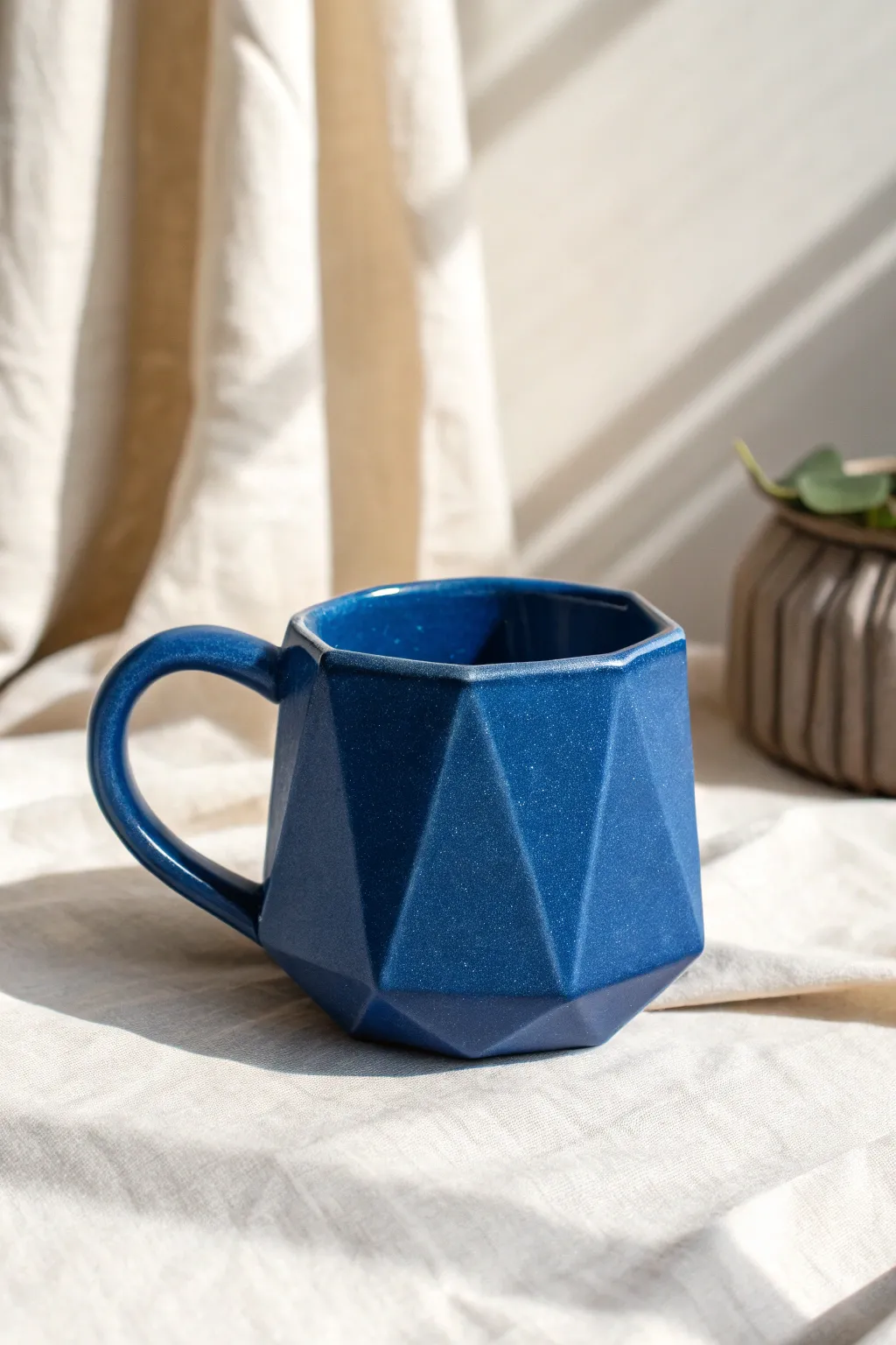 Gem-style faceted slab mug in bold glaze, simple planes and handmade charm with crisp contrast.