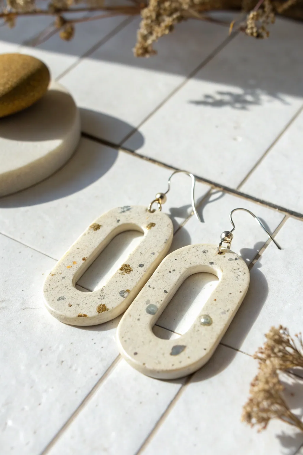 Minimal foil-fleck confetti polymer clay earring on matte white, modern sparkle with handmade charm