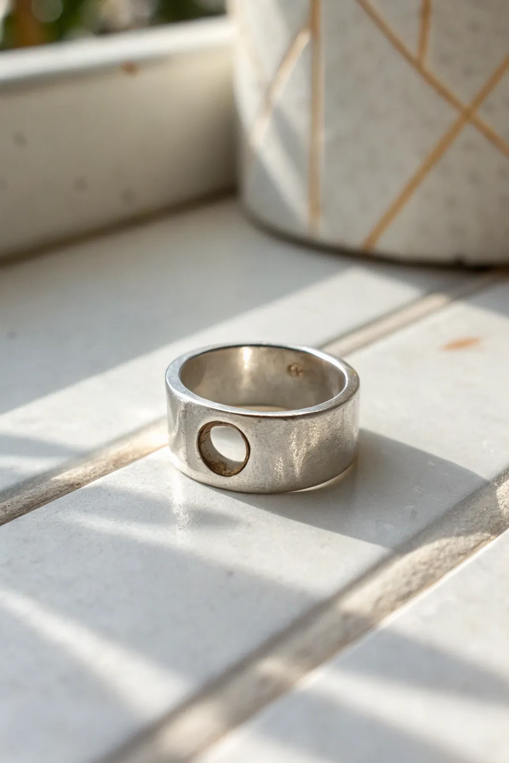 Minimal silver clay ring with bold negative space cutout, a beginner-friendly modern band.