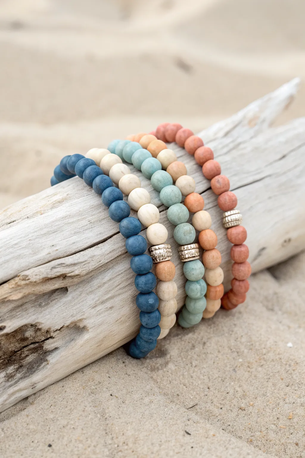 Beach memory clay bead bracelets in ocean, sunset, and sand tones for easy summer style