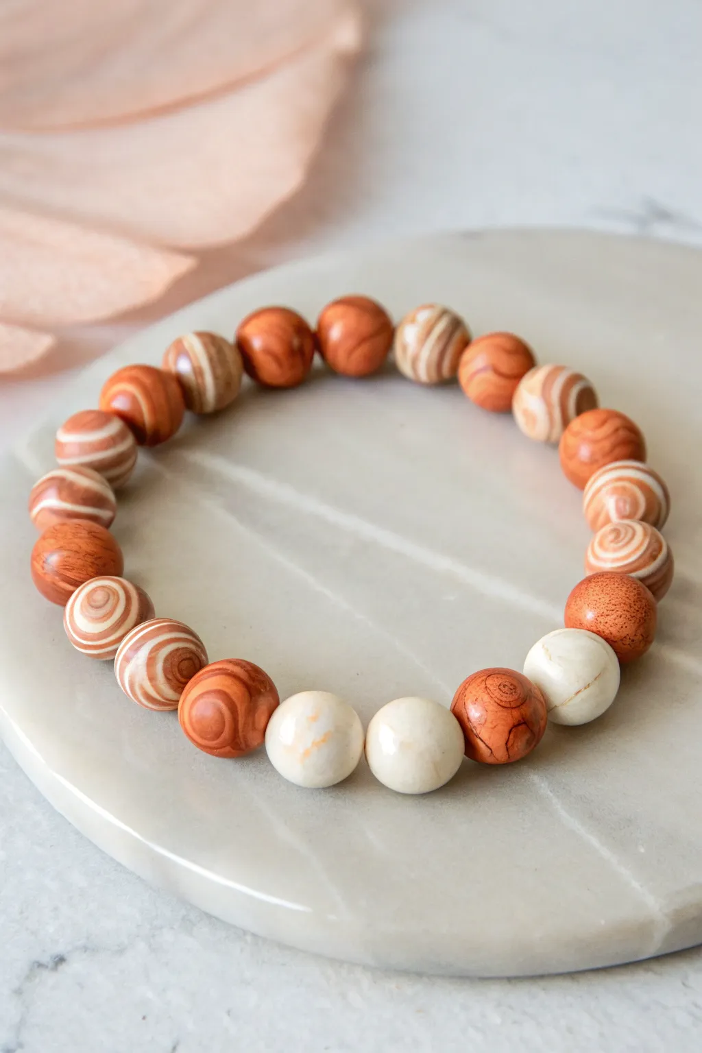 Softly swirled marbled clay beads meet simple heishi accents for an easy, modern DIY bracelet.