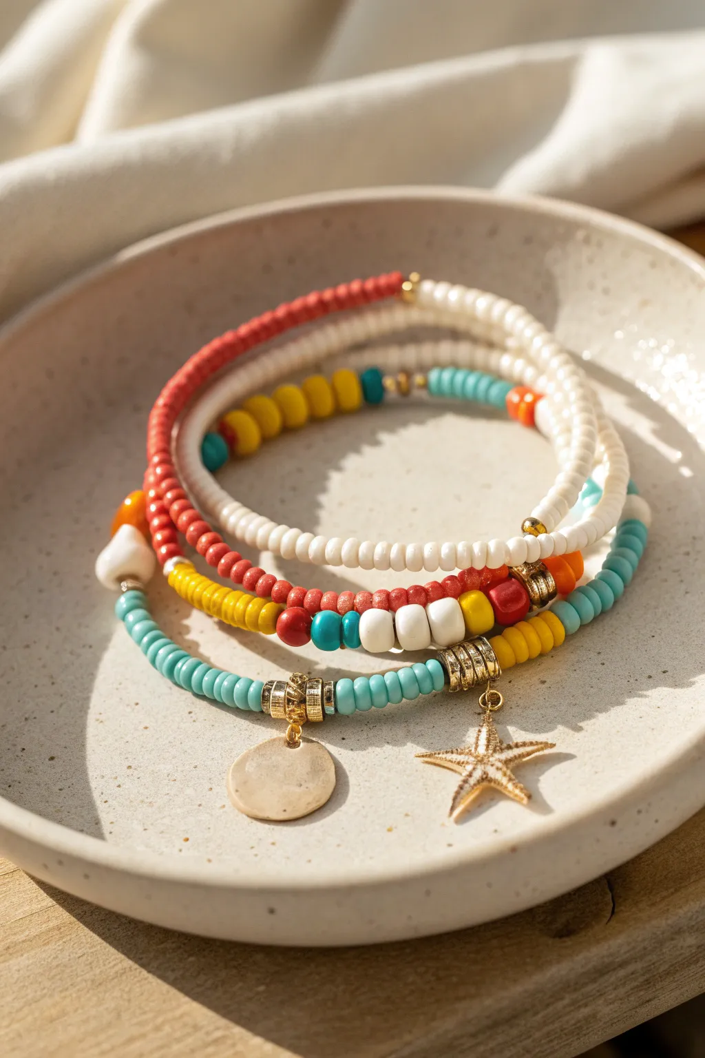 Vacation charm clay bead bracelet stack with bright heishi beads and tiny seaside-inspired charms