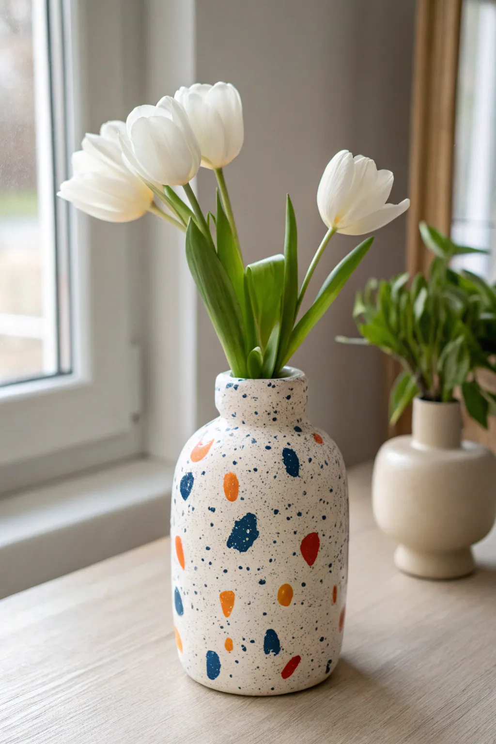 Terrazzo speckle ceramic vase with bold confetti dots, styled minimal for fresh Nordic boho.