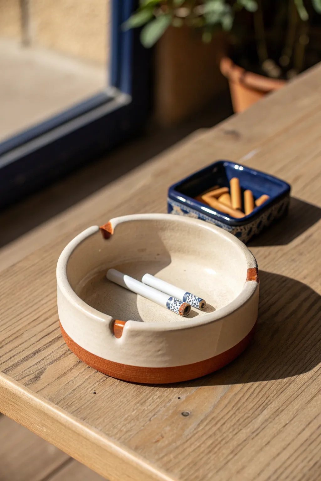 Minimal clay ashtray with built-in lighter pocket, a tidy tabletop station in bold earthy glaze