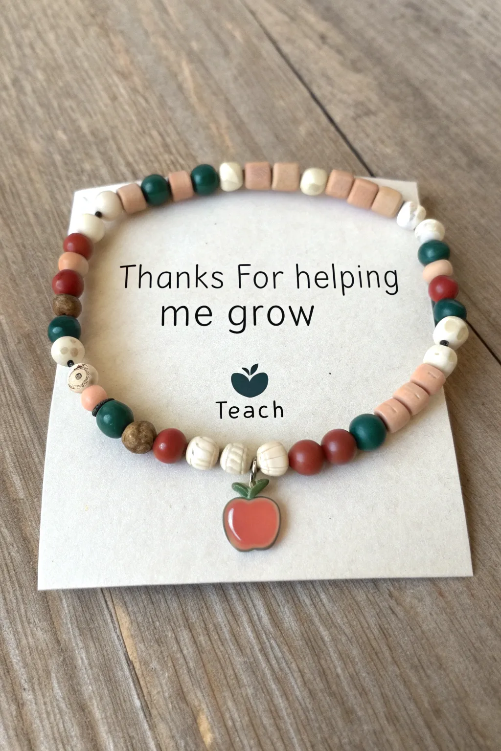 Teacher clay bead bracelet on minimalist gift-card backing with a sweet pun, ready to gift.