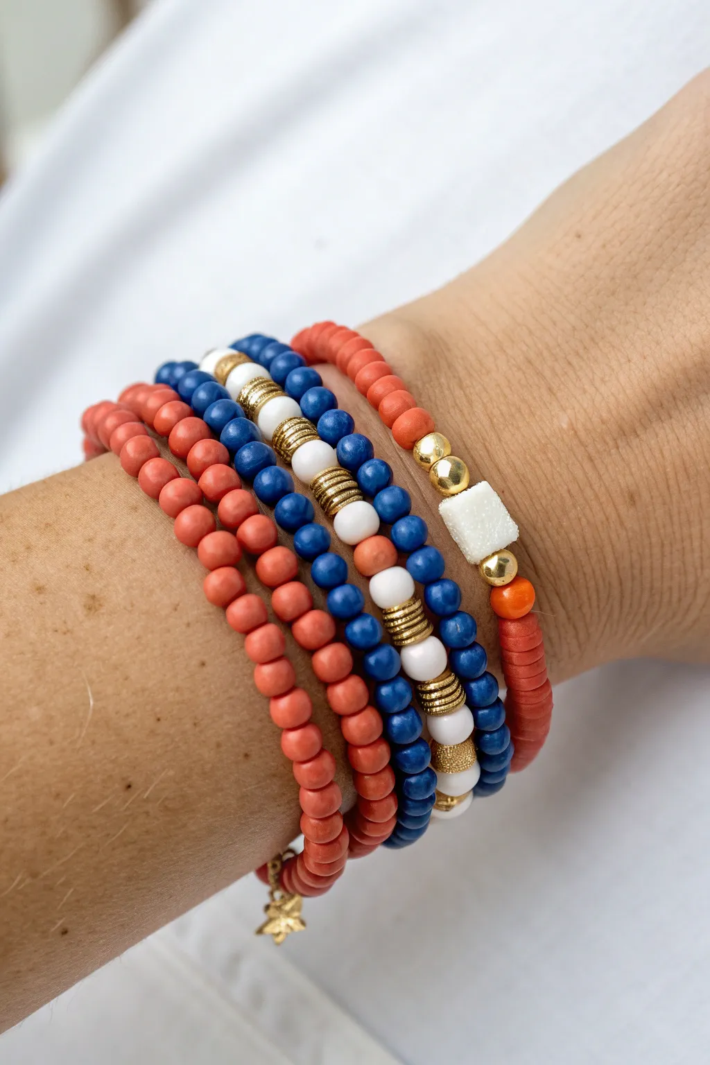 Stack 5 cute clay bead bracelets in one palette for an easy, matchy boho-minimal look.