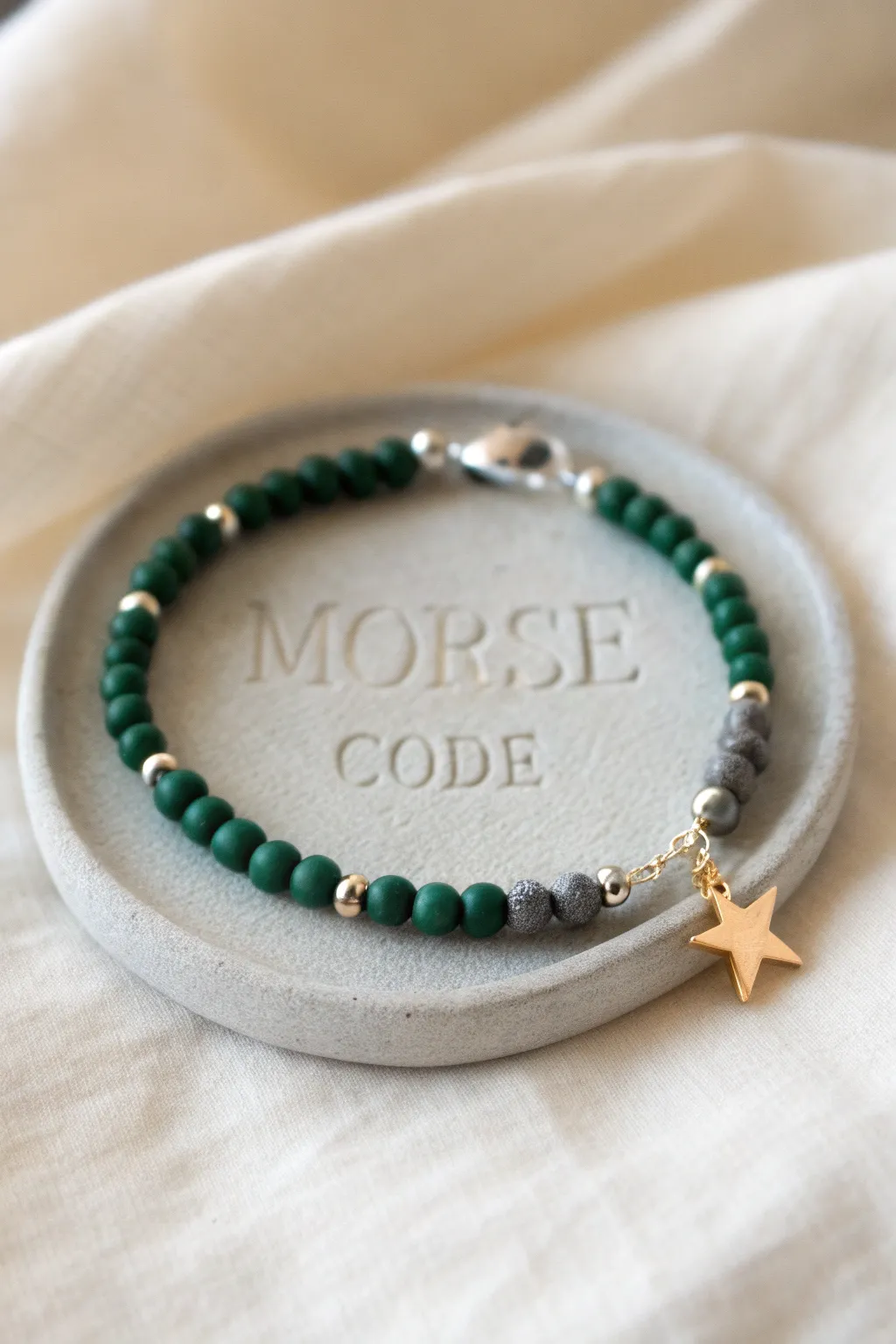 House-color Morse code bracelet: bold clay beads, simple pattern, and a tiny star charm