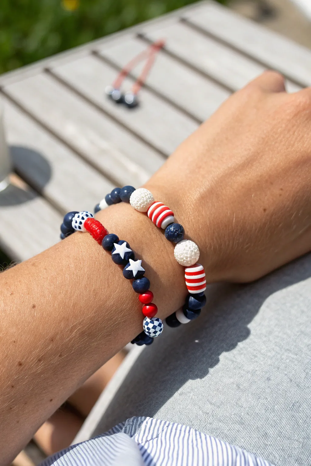 Stars-and-stripes clay bead bracelet: navy stars with crisp red and white stripes for July 4.