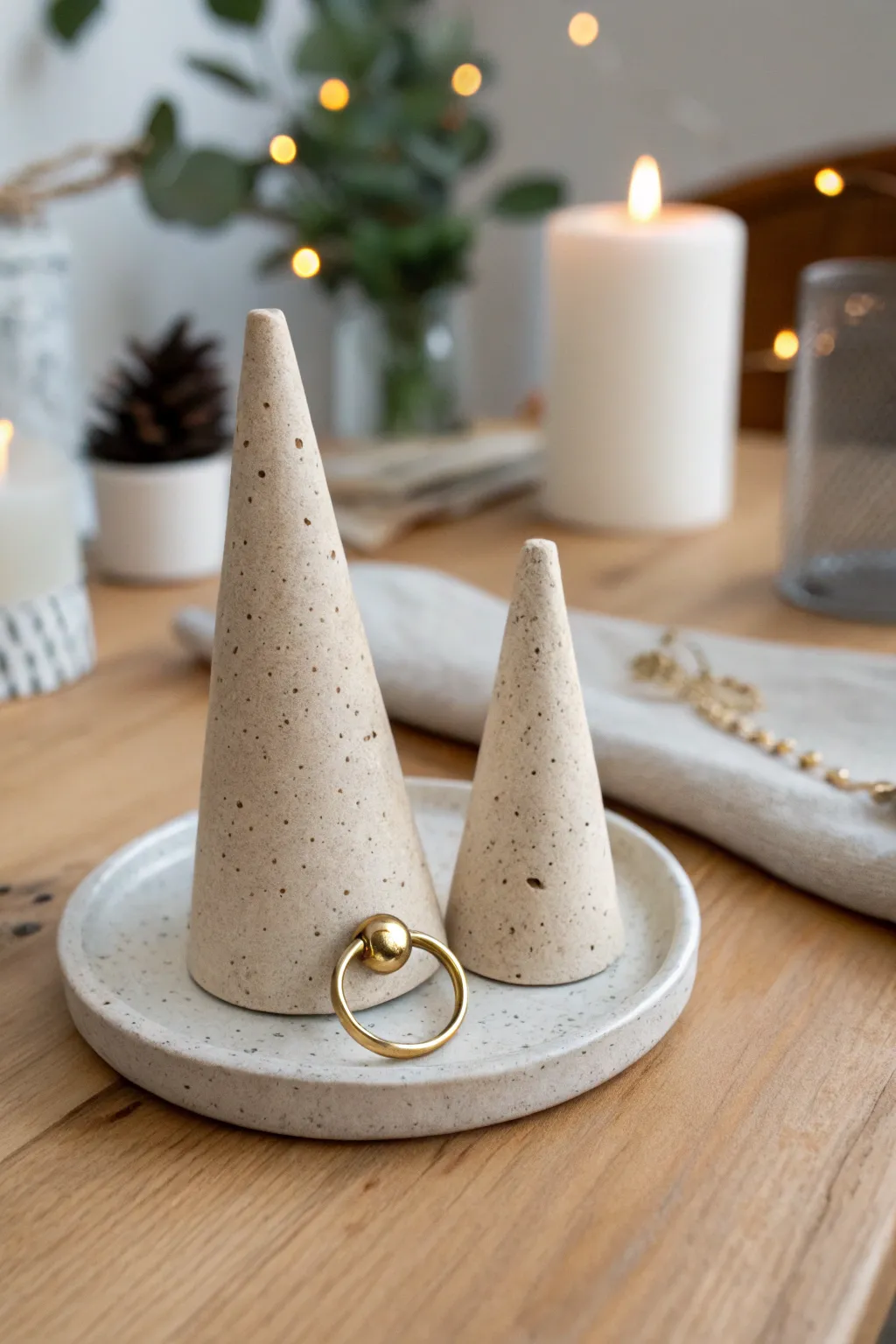 Two personalized air dry clay ring cones, perfect for a cozy date night craft and gift set.
