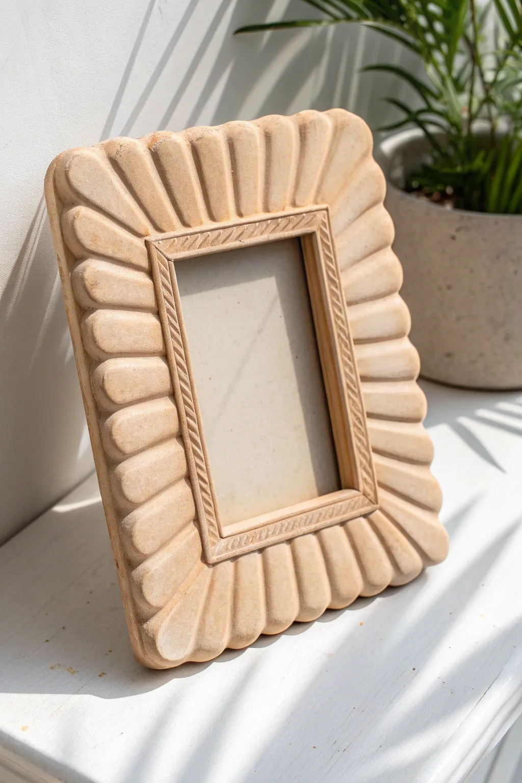 Neutral air dry clay frame with a simple scalloped edge, styled minimal on white with soft shadows.