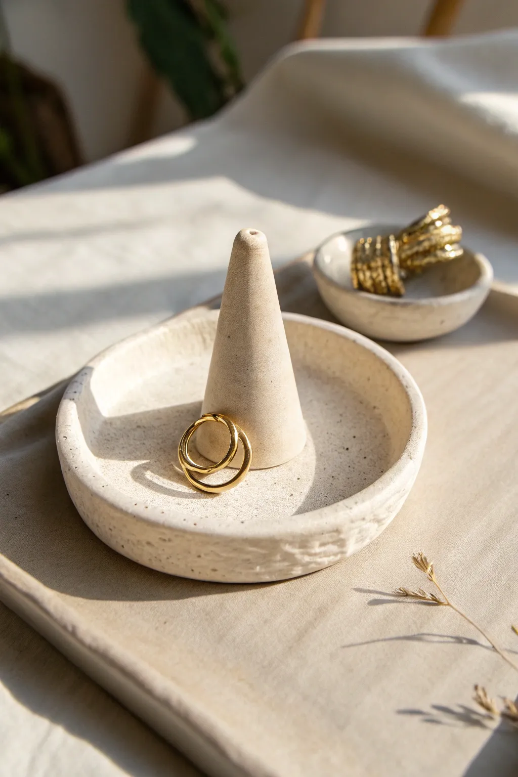 Minimal air-dry clay ring cone with tiny tray, a chic neutral catchall for everyday jewelry.