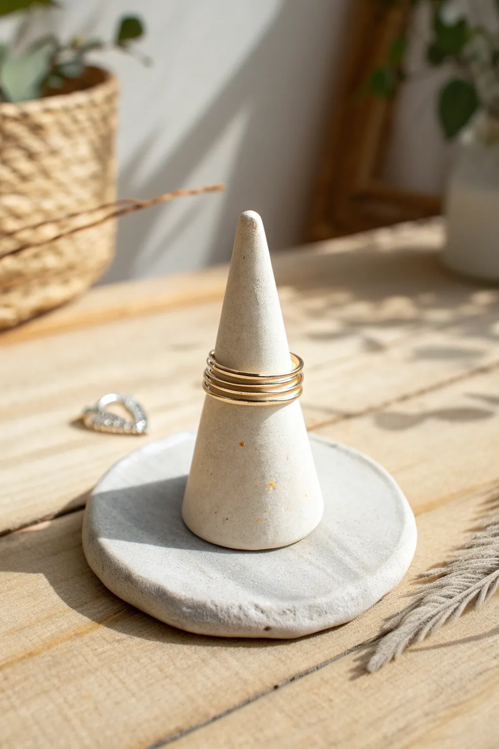 Minimal air dry clay ring cone holder with a matte finish and stacked rings, clean and modern.
