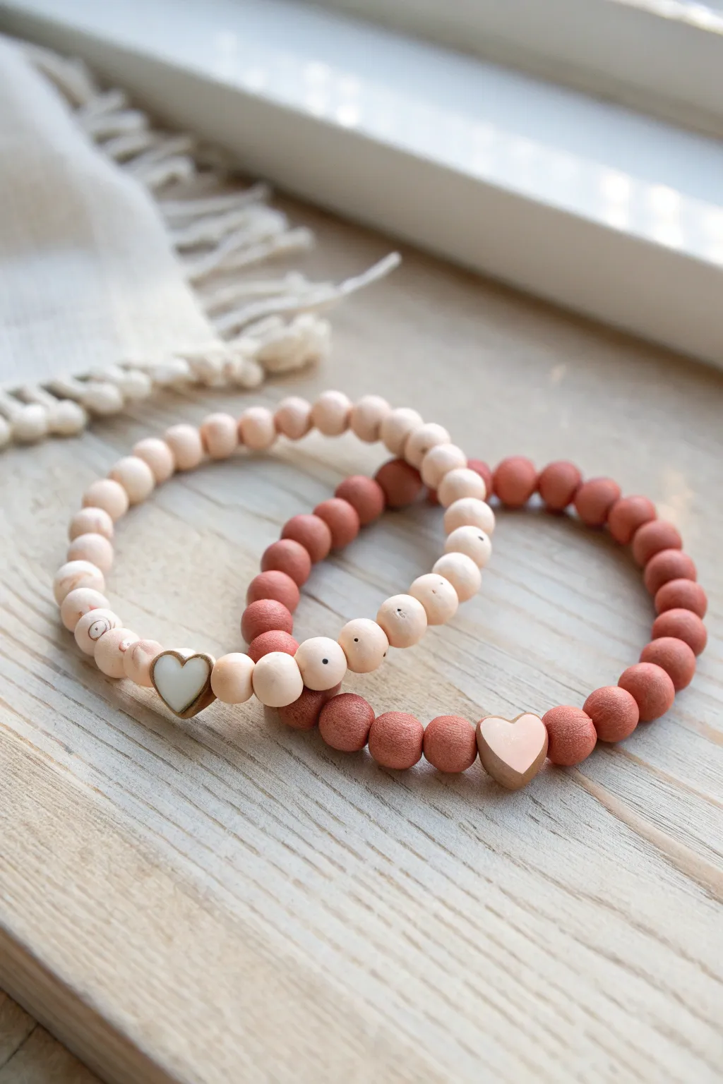 Split heart clay bead bracelets for best friends, minimalist boho set with warm earthy tones.