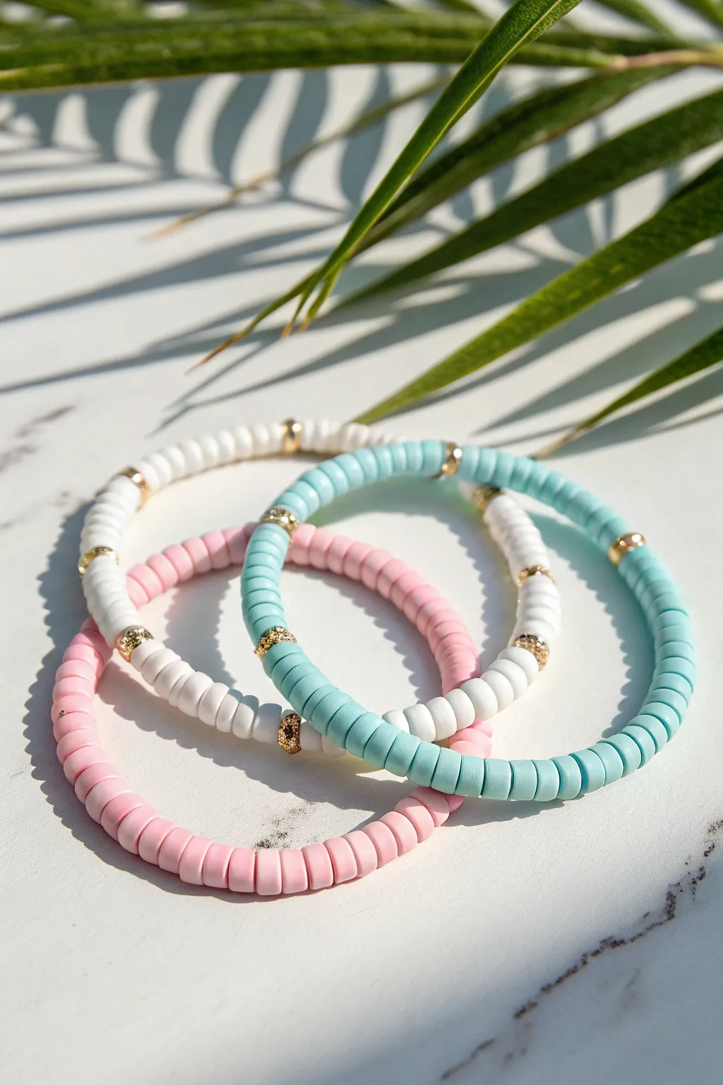 Pastel preppy color-block heishi bracelets with tiny spacers for a clean, modern boho vibe.