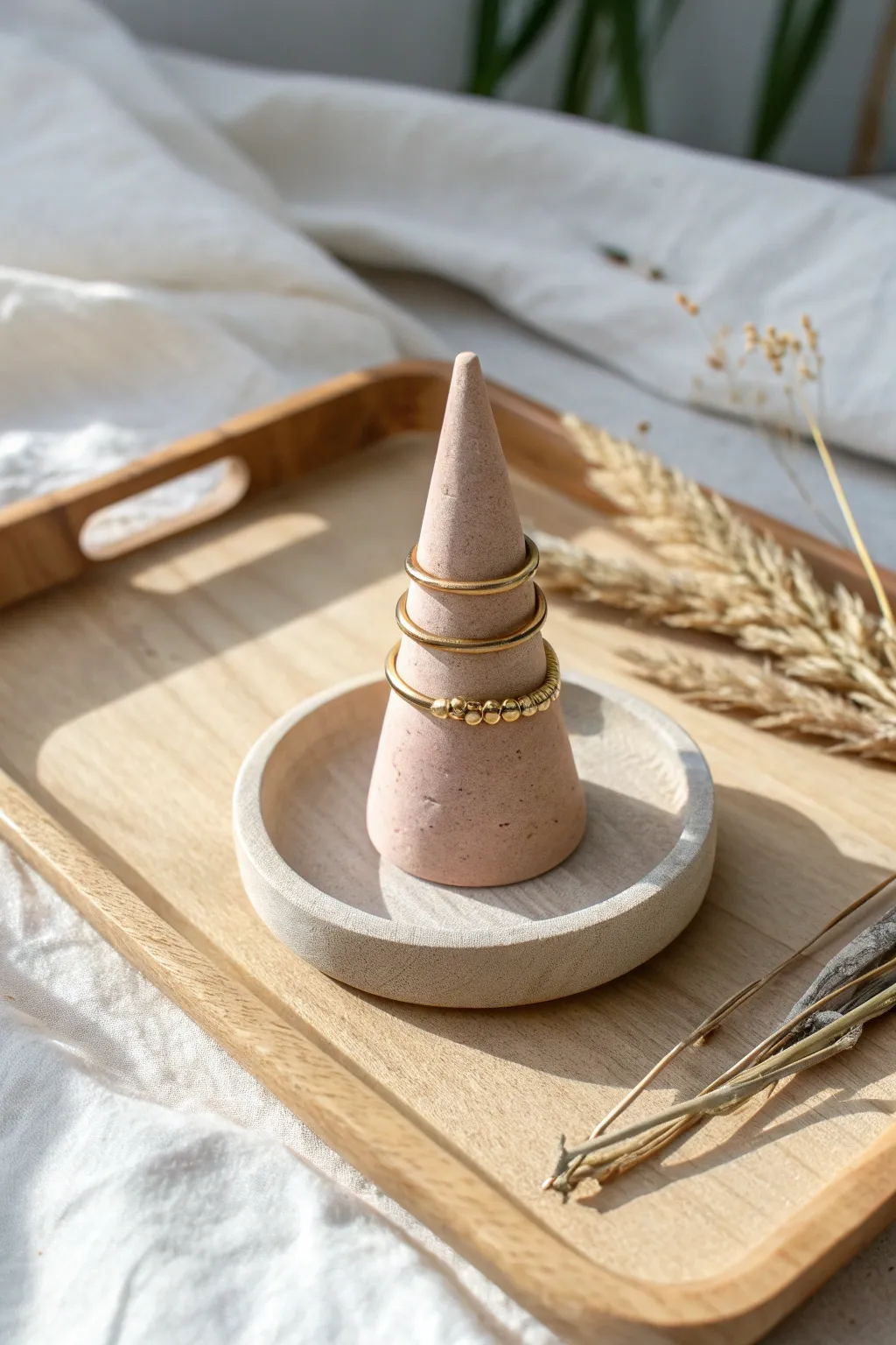 Minimal clay cone ring holder in muted tones, a sweet handmade gift for jewelry lovers
