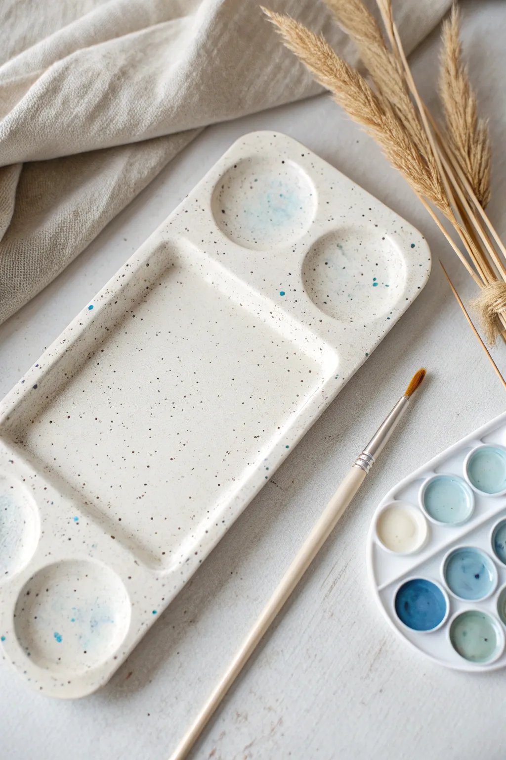 Rectangular slab clay palette with generous mixing space and tidy wells for dreamy washes.