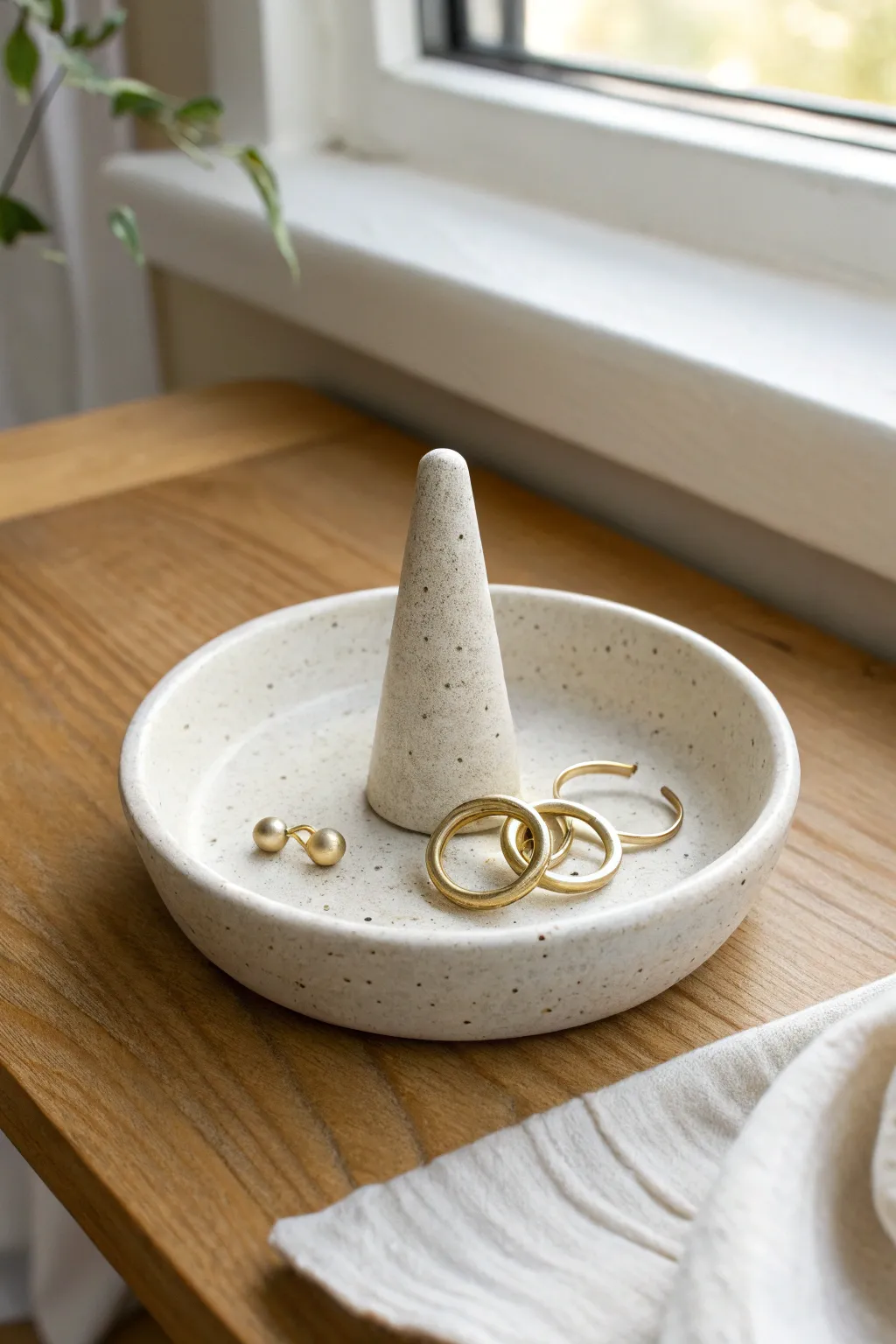 Minimal clay ring cone with trinket dish base for a tidy, beautiful jewelry drop zone