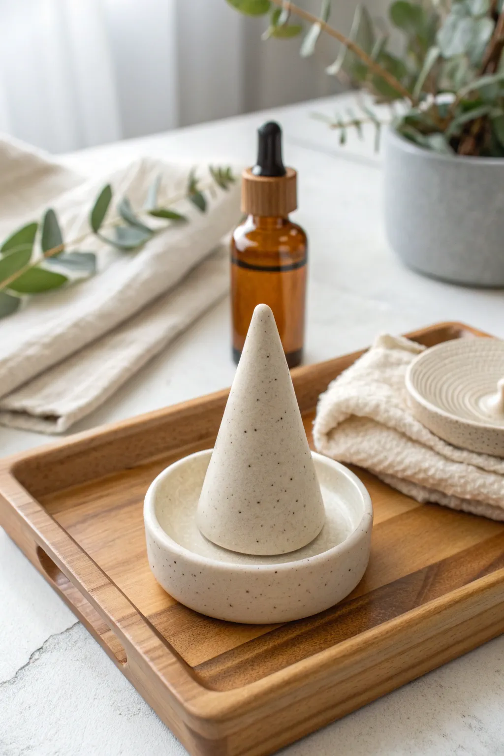 Minimal clay ring cone and matching catchall dish for a calm Scandinavian boho vanity moment