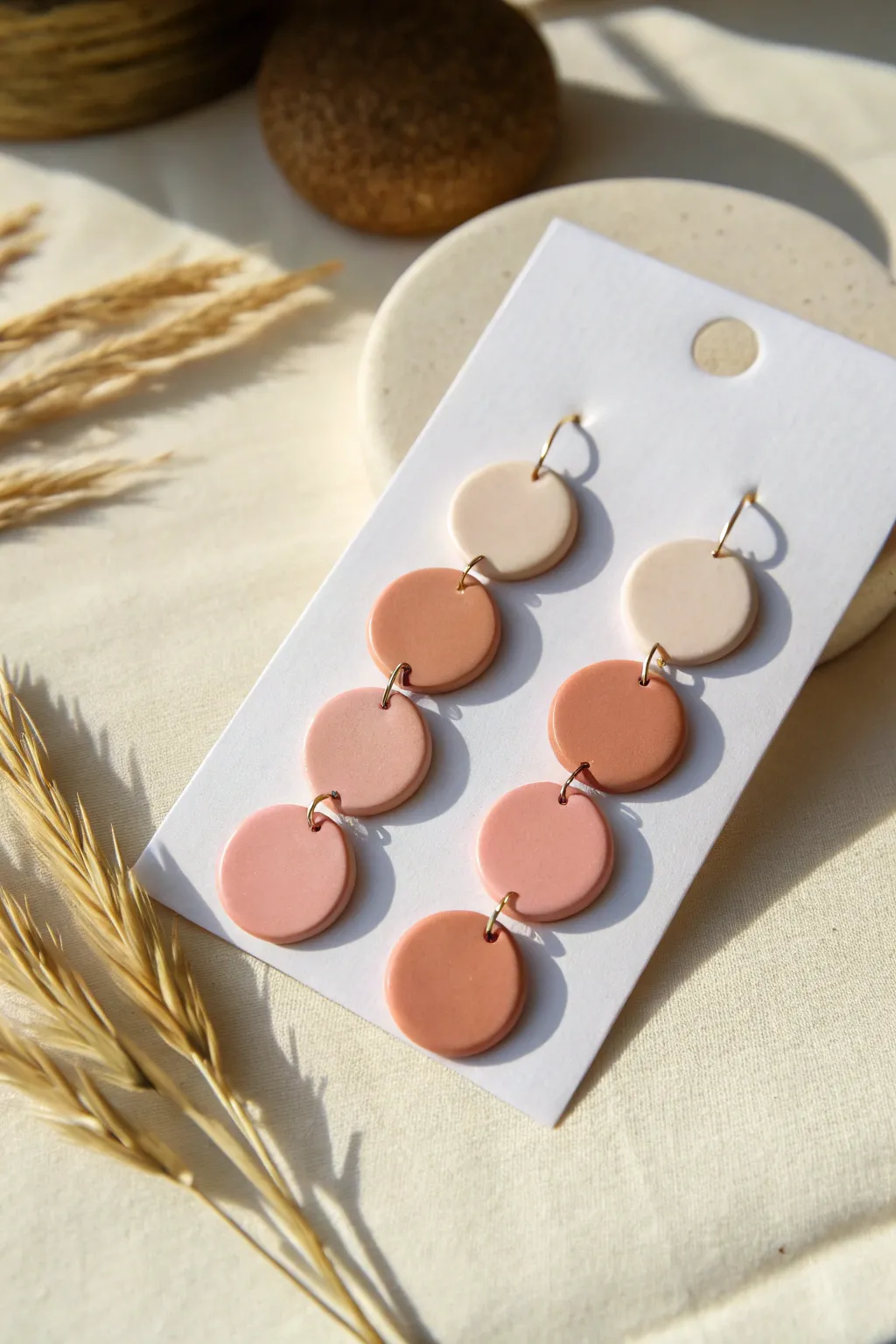Minimal circle stud earrings in blush and terracotta, an easy polymer clay DIY with clean style