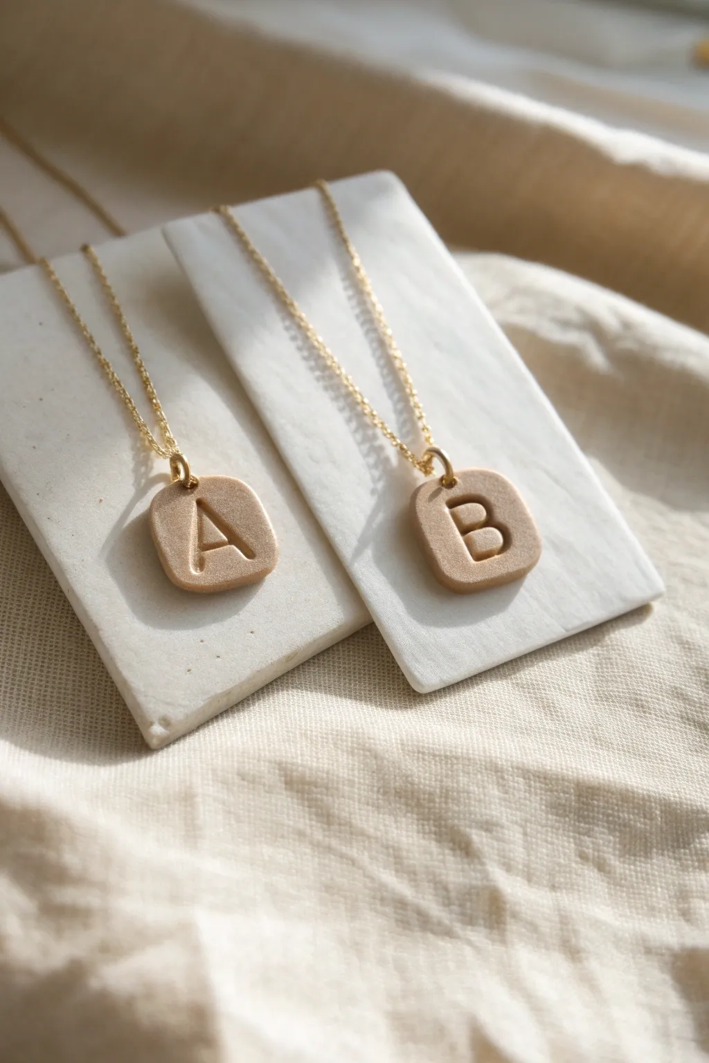 Two matching clay initial necklaces, simple and sweet, a handmade friendship keepsake