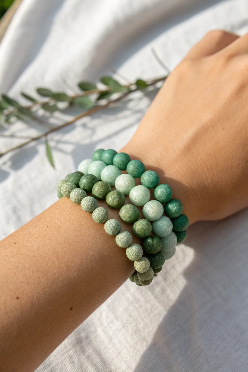 Mint to forest green ombre clay bead bracelet stack, simple, chic, and easy to DIY.