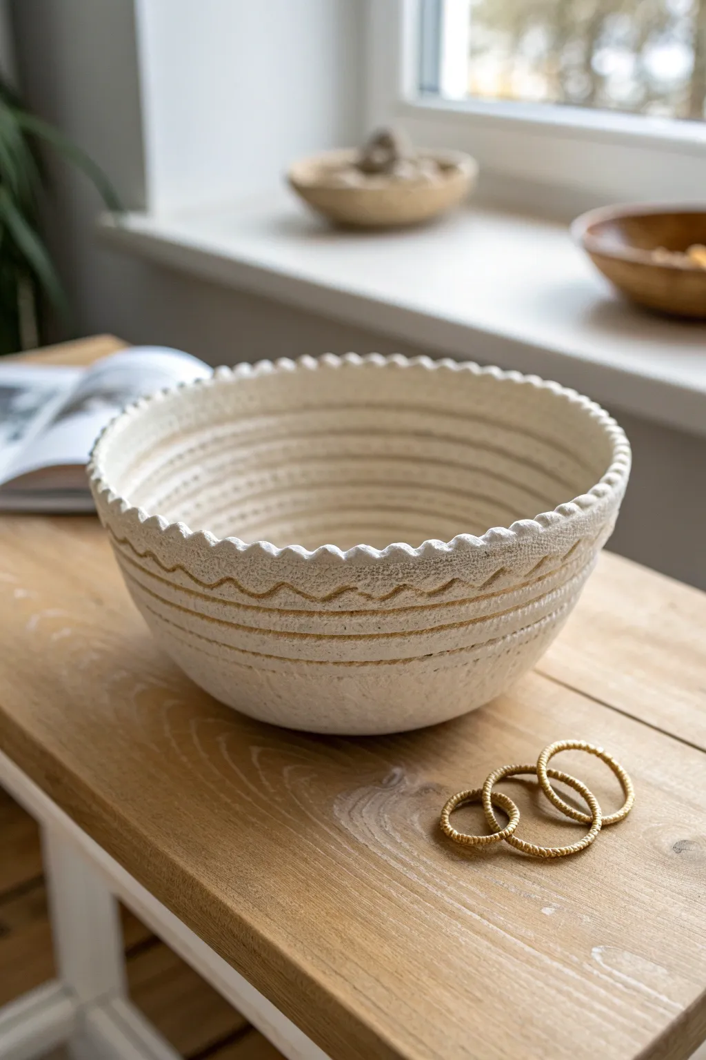 Coil-built bowl with a soft wavy rim, perfect as a minimalist coffee-table catchall.
