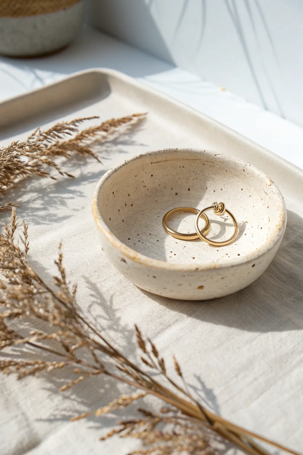 A sweet minimalist pinch pot dish for rings and earrings, bright, calm, and handmade.