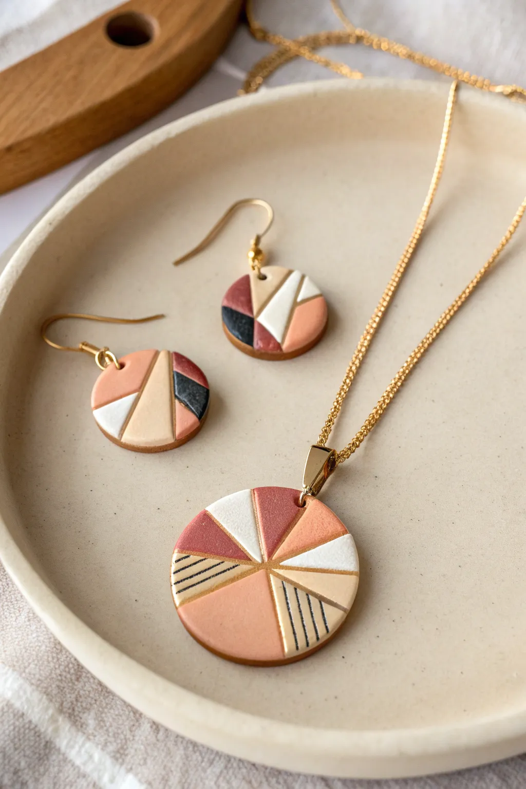 Retro geometric cane veneer pendant with matching studs, styled minimal and softly boho