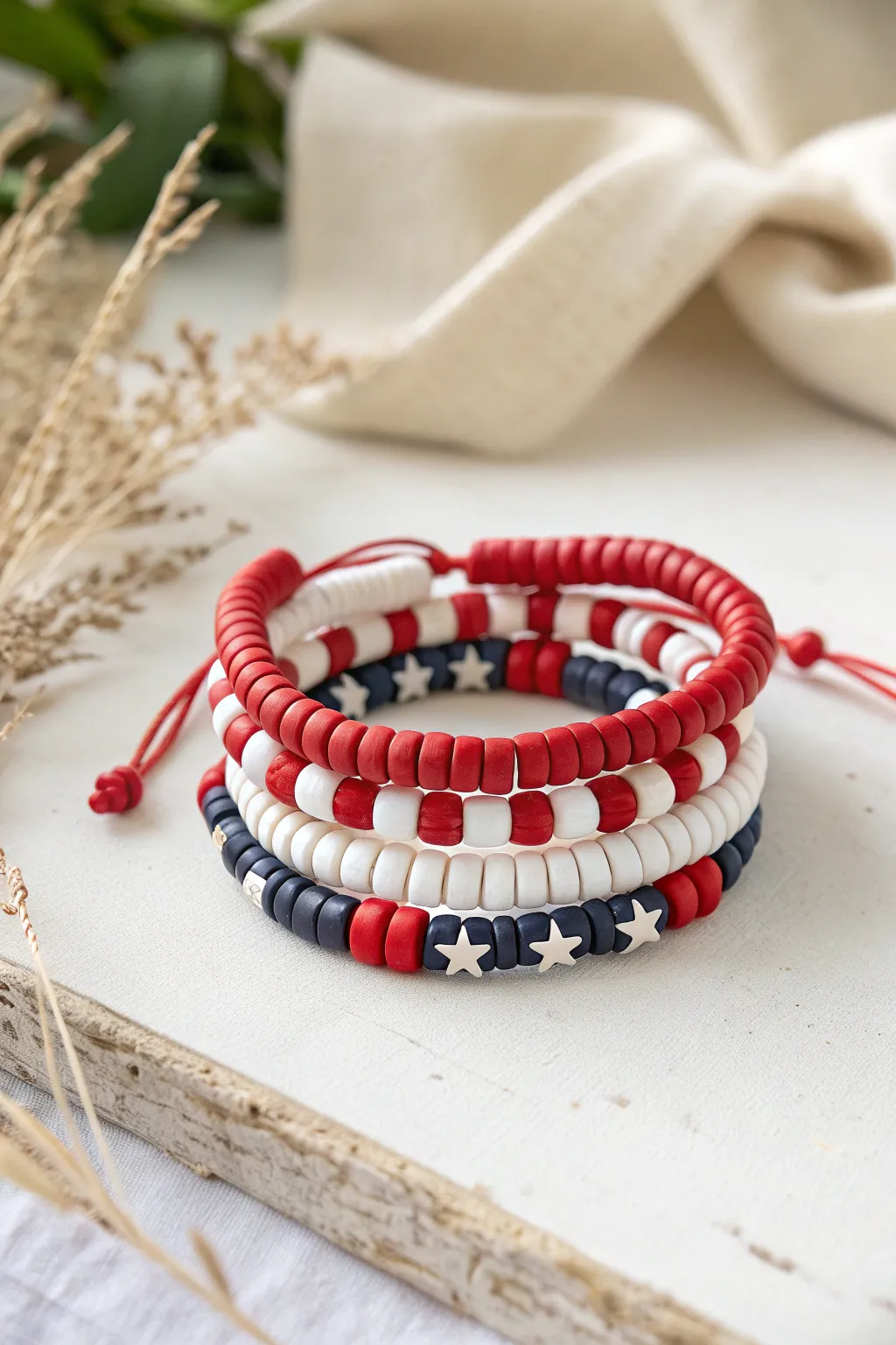 Stars and stripes color-block heishi bead stack for an easy, modern Fourth of July look.