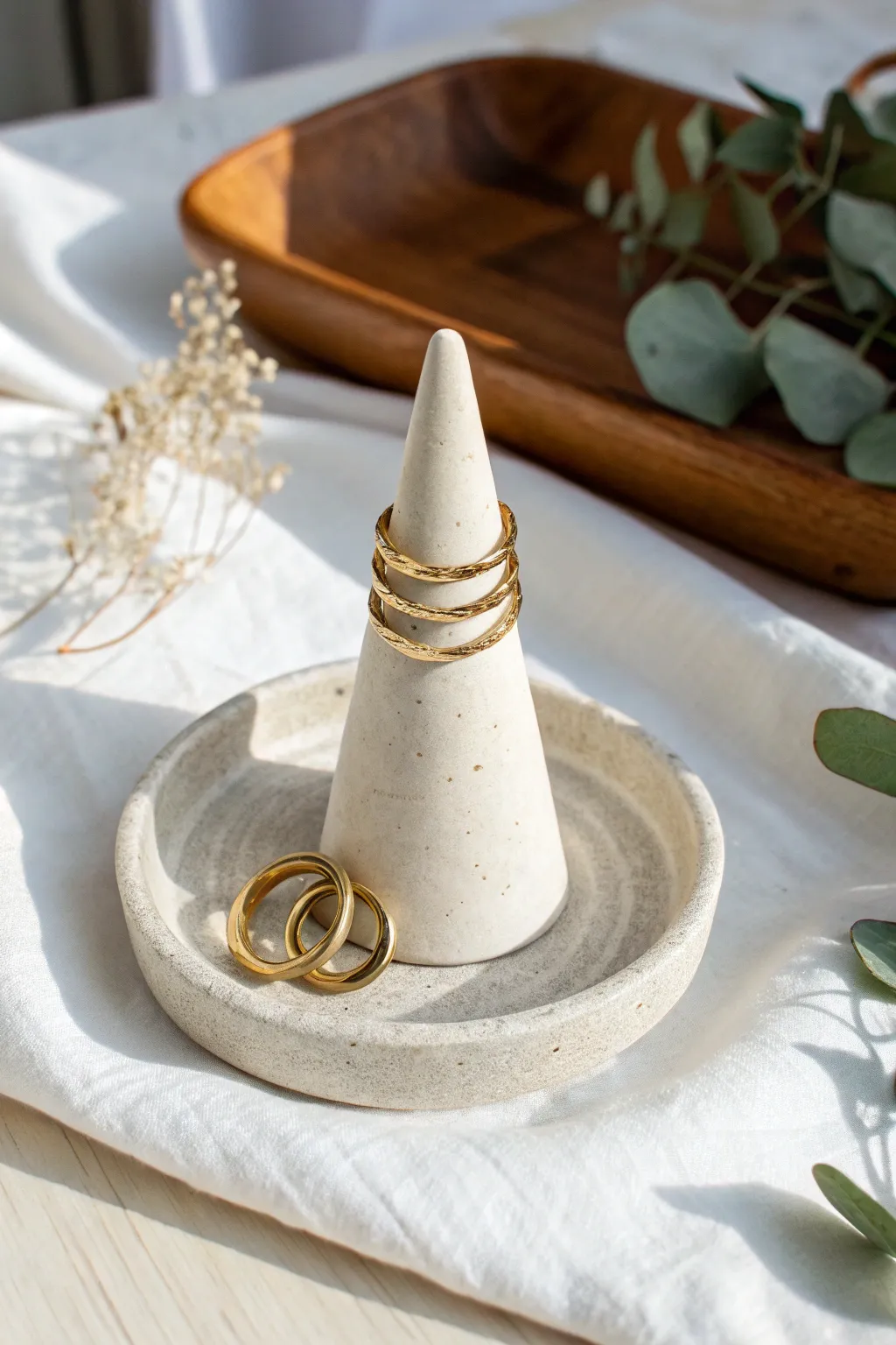 Minimal white clay ring cone holder with soft light, warm neutrals, and a calm handmade feel.