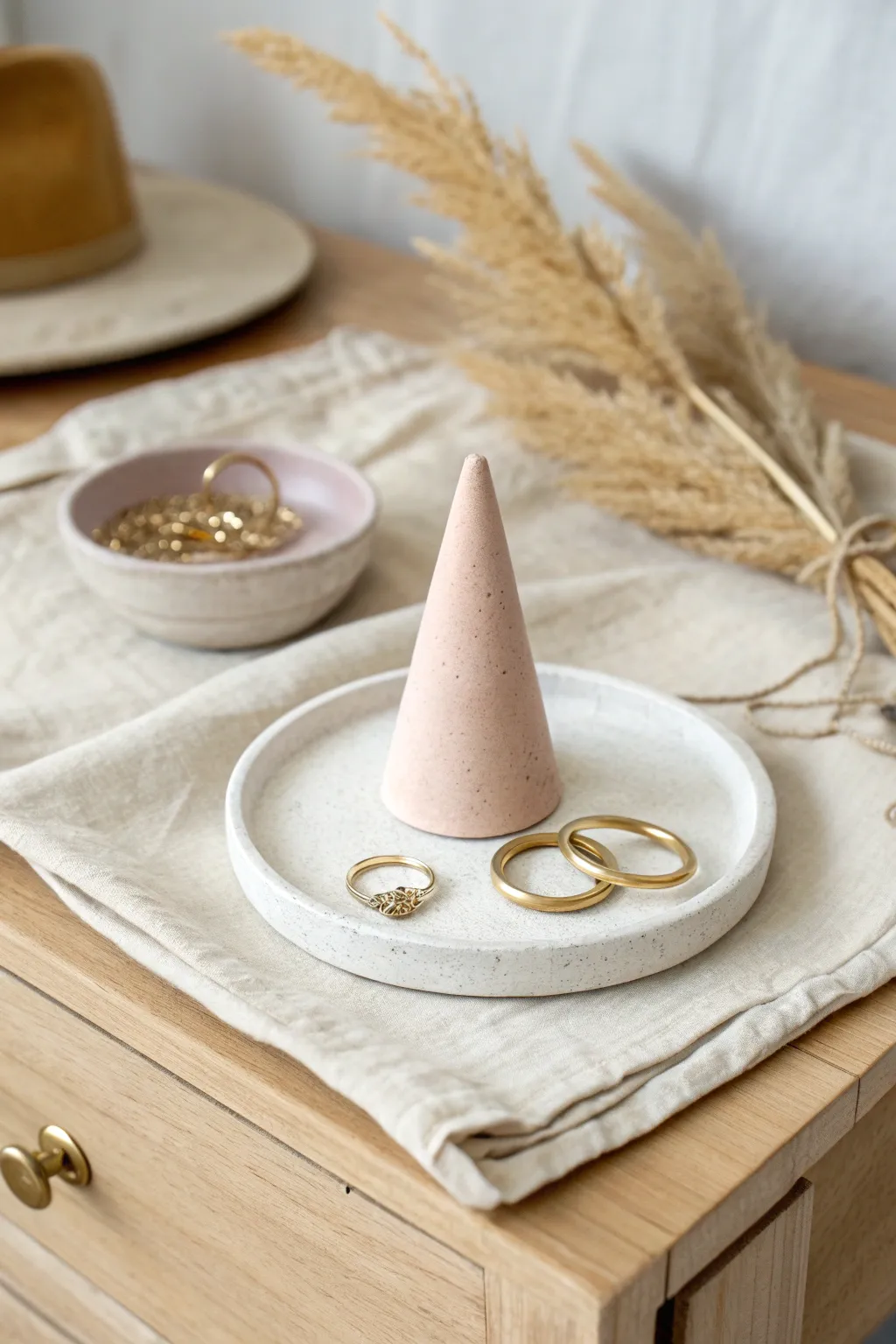 Matte pastel ring cone with matching dish keeps your nightstand calm, tidy, and beautiful.