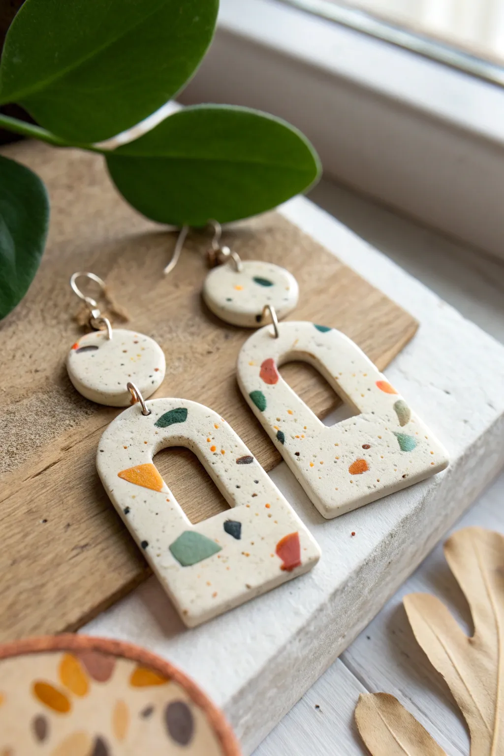 Bold terrazzo air dry clay statement earrings, close-up speckles and matte handmade texture