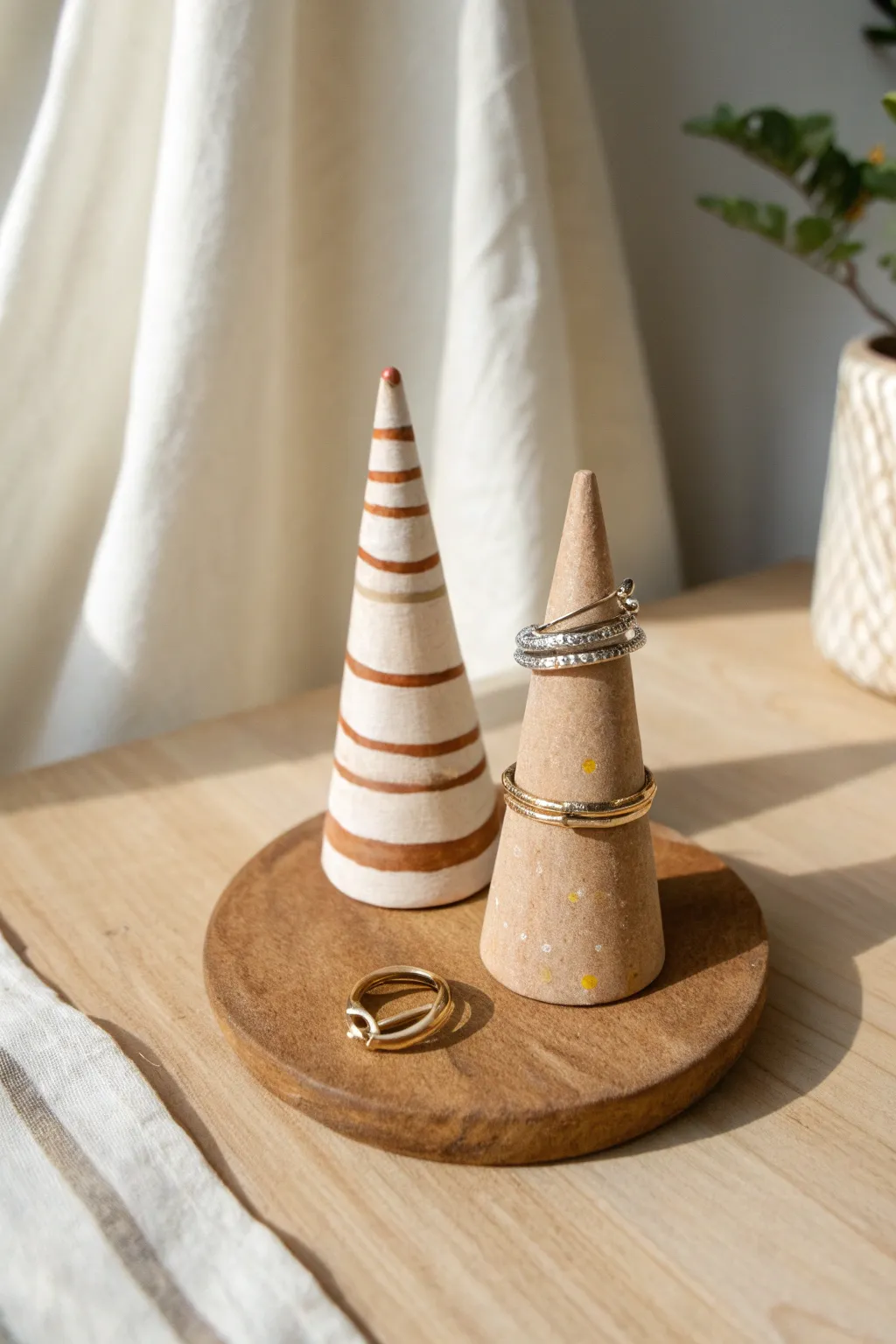 Two easy DIY clay ring holder cones in minimalist Scandi style, perfect for simple crafts