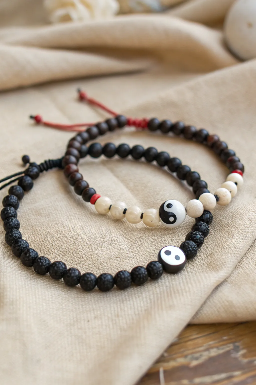Minimal yin-yang clay bead bracelet set for couples in black and white, simple and balanced