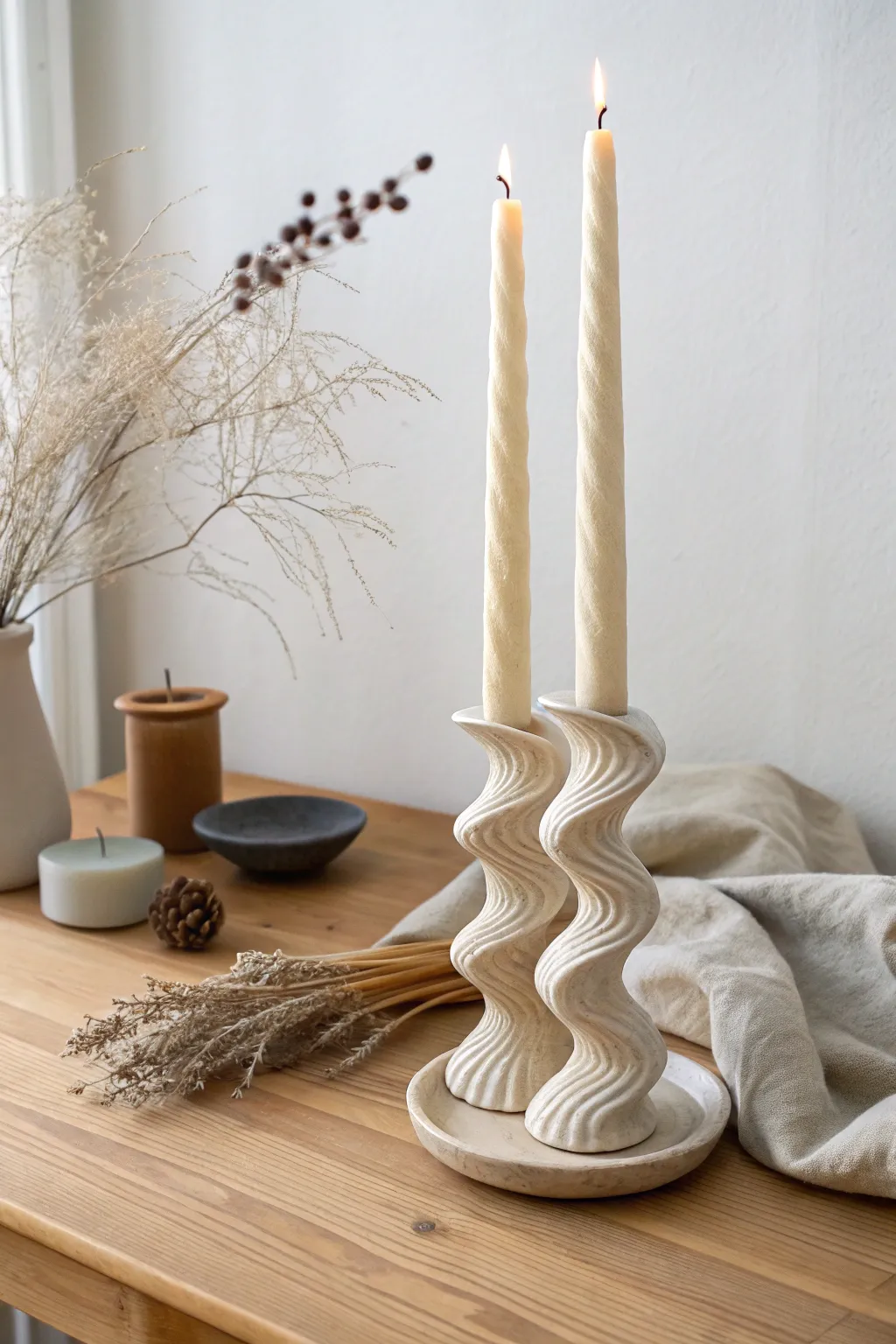 Wavy squiggle clay taper base in soft neutrals for a minimal boho table centerpiece