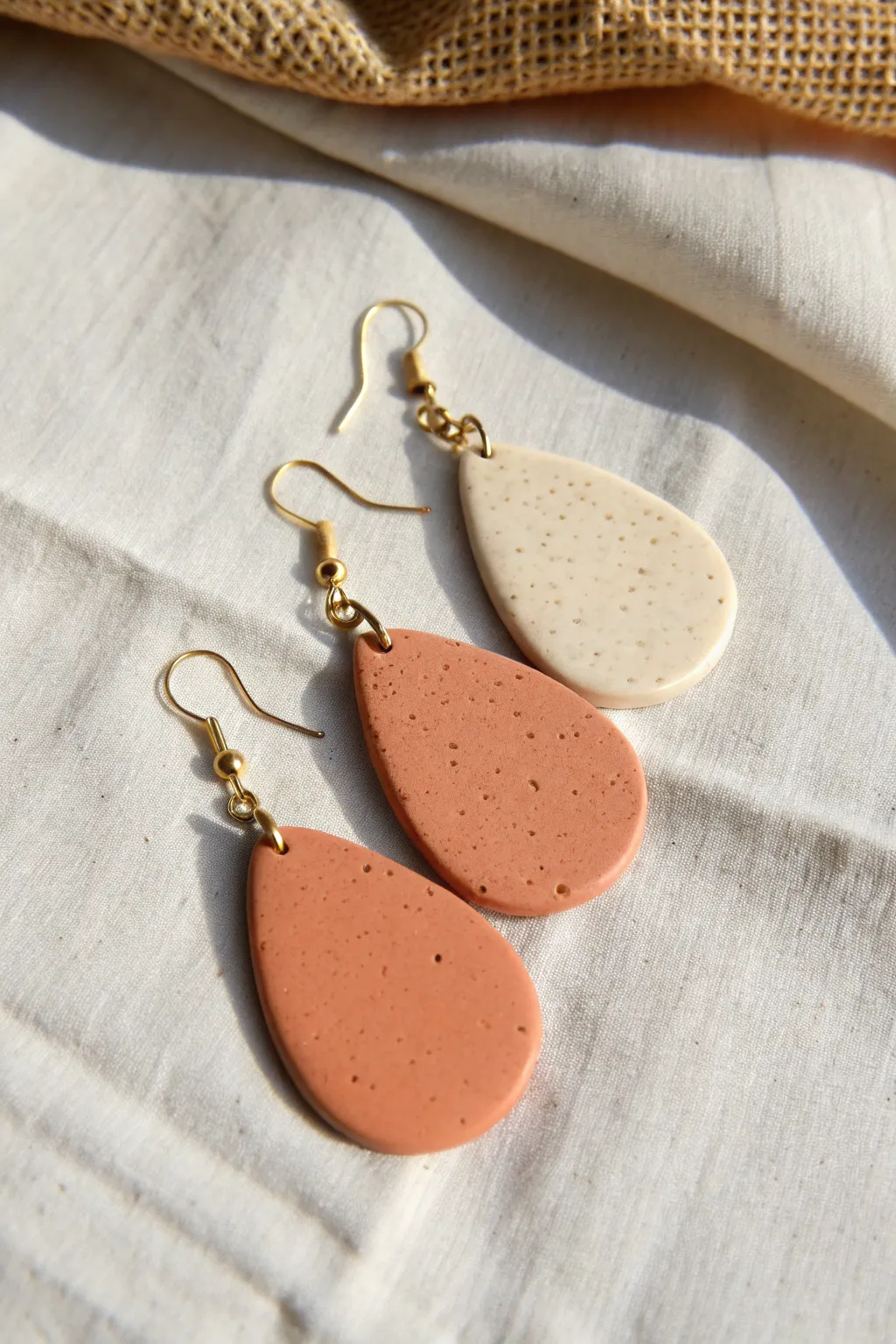 Simple teardrop clay earrings, solid and speckled, an easy beginner shape with modern charm.
